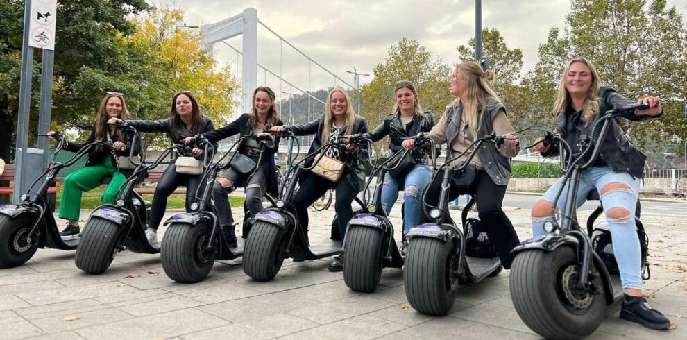 Electric scooters in Budapest - a group of girls about to start their scooter tours